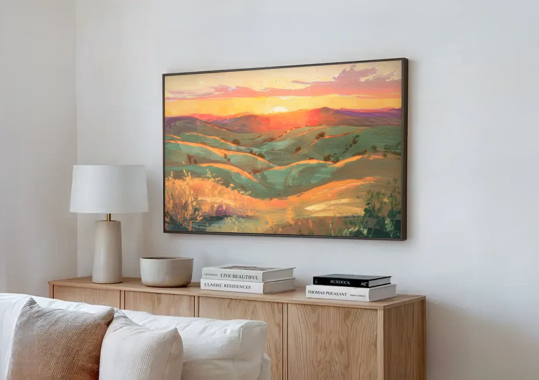 Bisbee Sunset Over Hills canvas wall art above a wooden sideboard next to a sofa