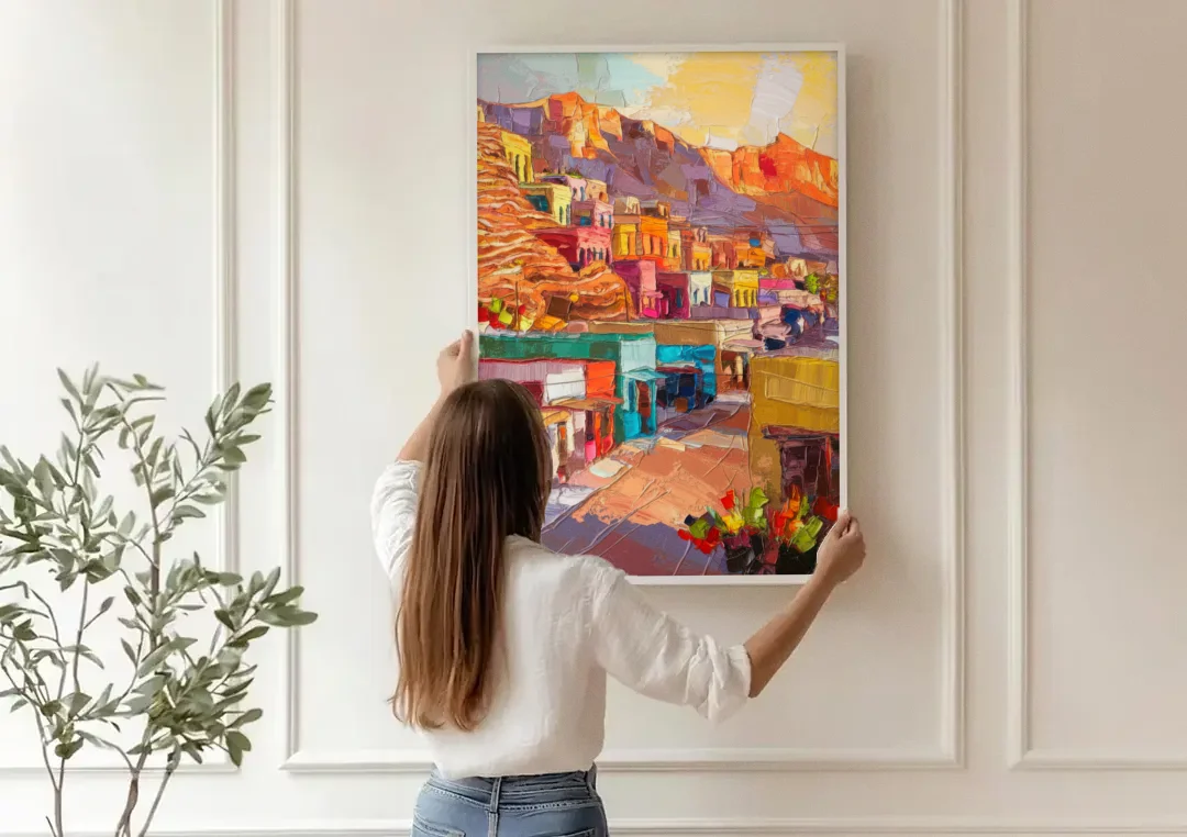 Bisbee Vibrant Skyline canvas wall art being hung on a paneled wall