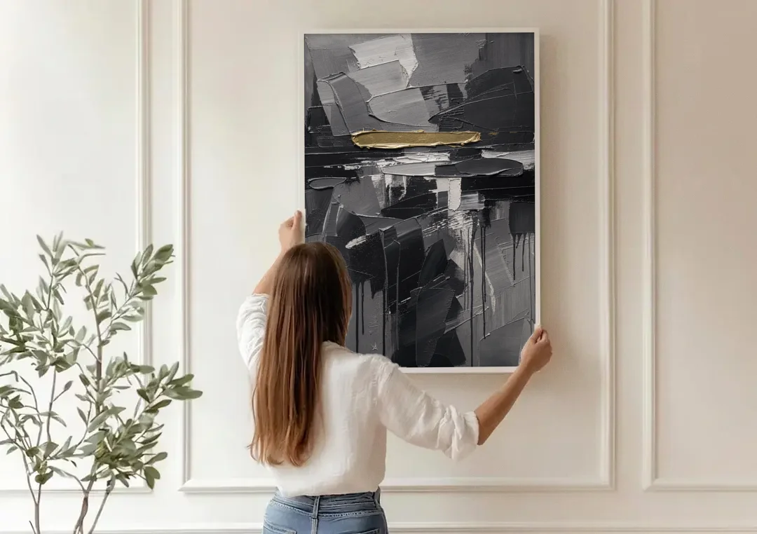 Black and Gold Abstract Knife Field for the Modern Office canvas wall art being hung on a paneled wall