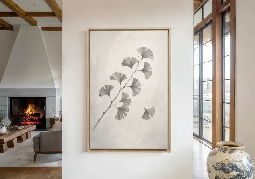 Black and White Bedroom Decor With a Ginkgo Sprig canvas wall art in a living room with a fireplace