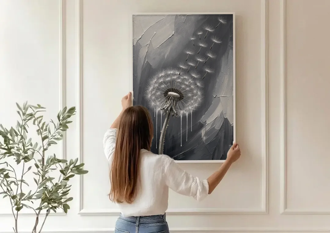Black and White Canvas Prints with Drifting Dandelion canvas wall art being hung on a paneled wall