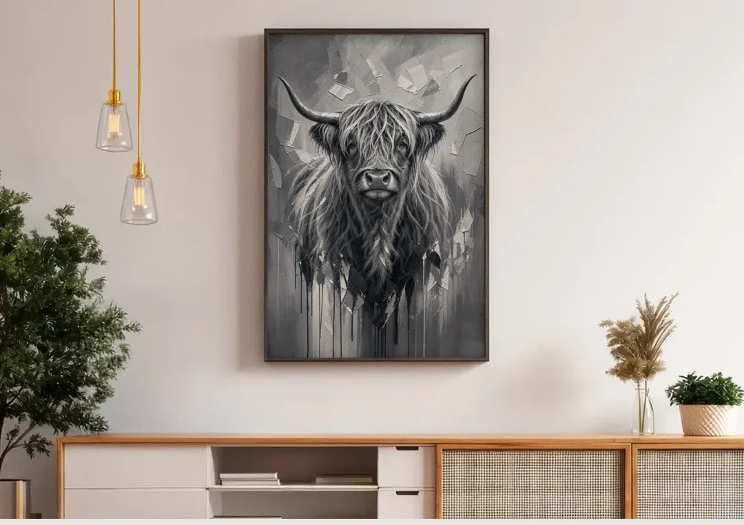Black and White Farmhouse Shaggy Highland Cow canvas wall art above a wooden sideboard under pendant lights