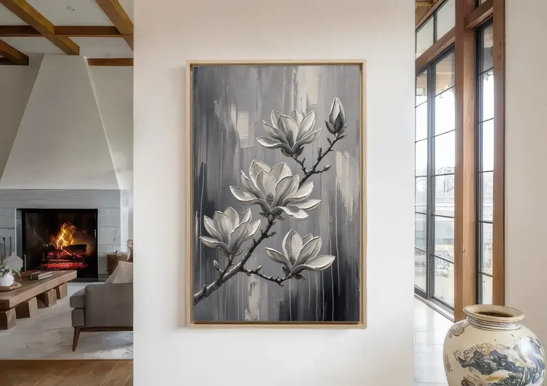 Black and White Floral Canvas of a Magnolia Branch canvas wall art in a living room with a fireplace