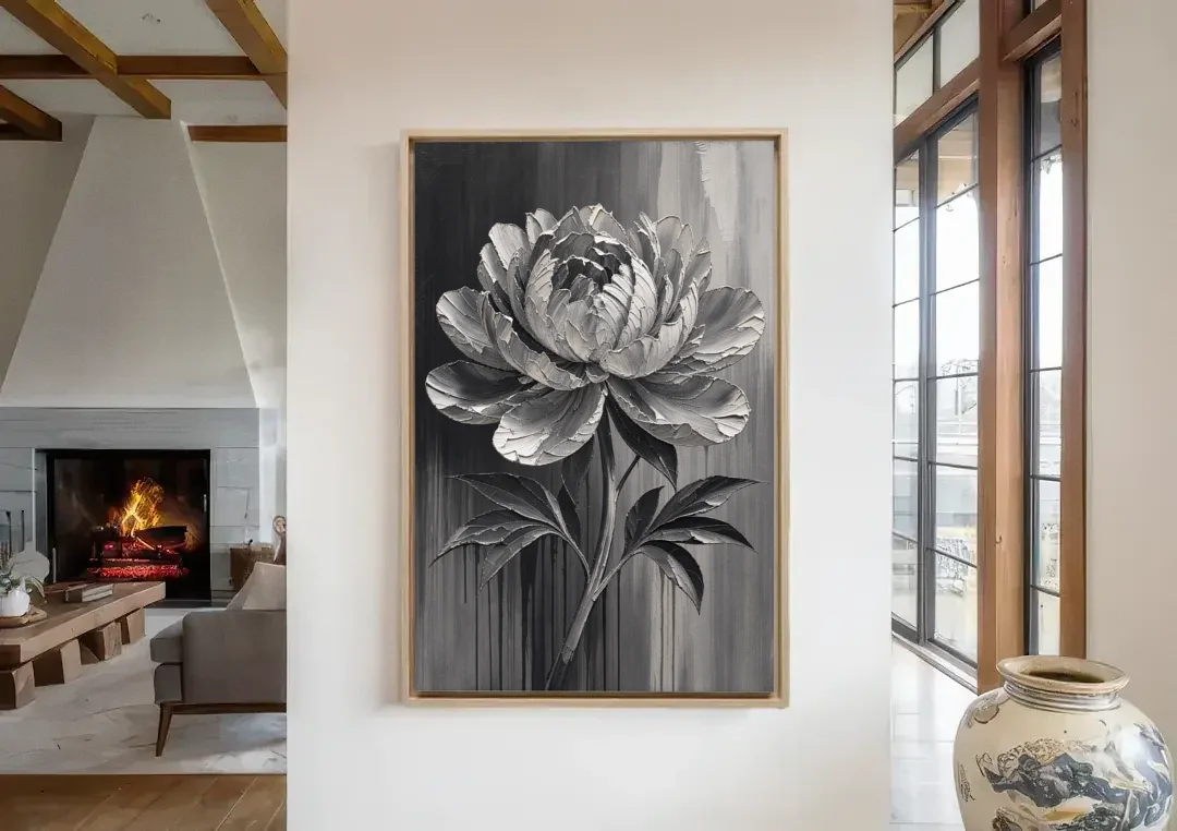 Black and White Flower Painting of a Peony canvas wall art in a living room with a fireplace