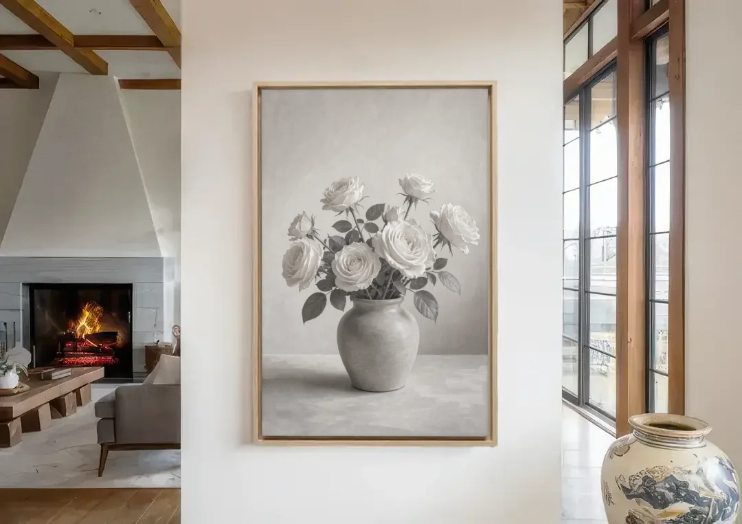Black and White Garden Roses in a Stone Vase canvas wall art in a living room with a fireplace