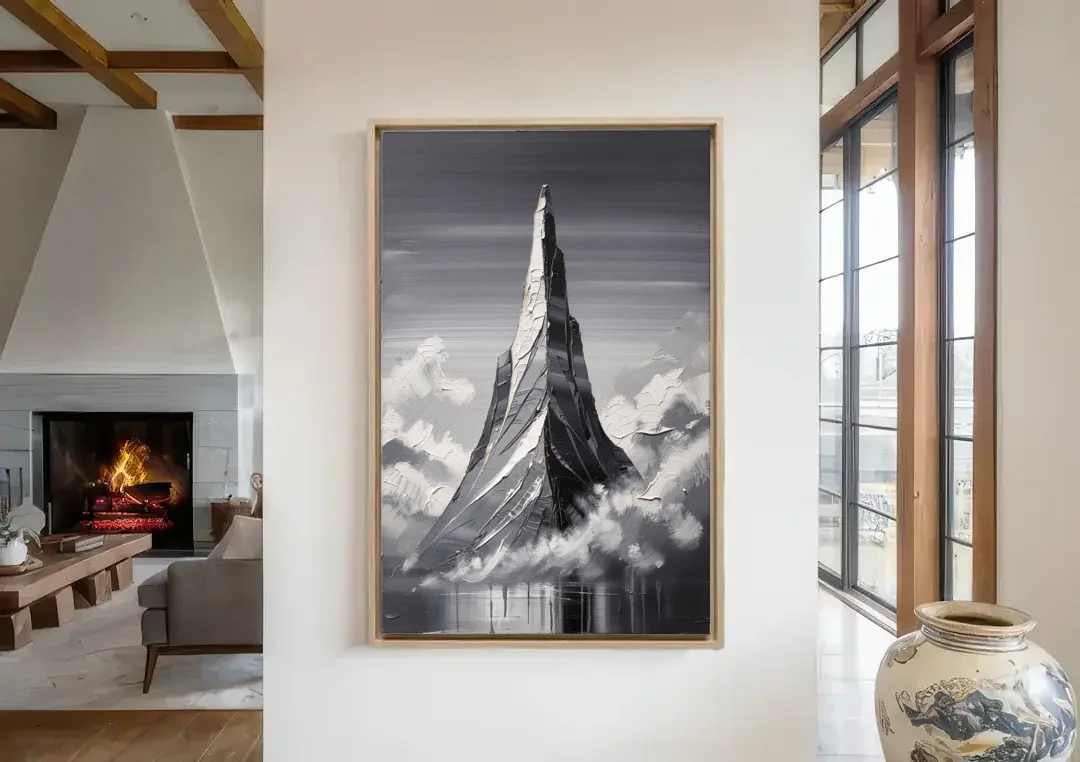 Black and White Granite Mountain Spire canvas wall art in a living room with a fireplace
