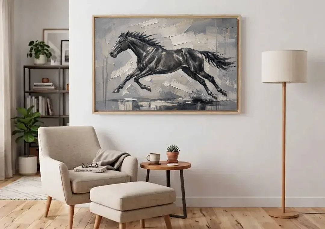 Black and White Horse Painting in Full Stride canvas wall art above an armchair in a bright living room