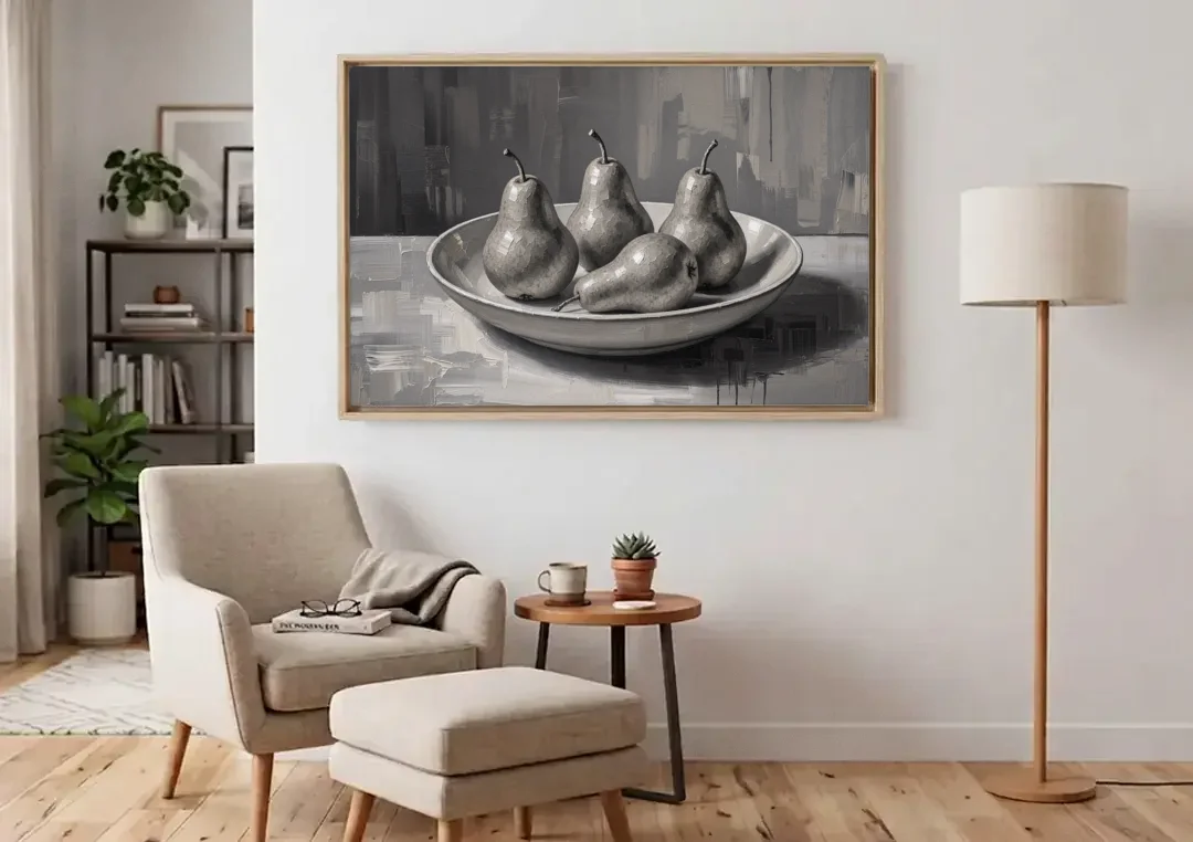Black and White Kitchen Wall Art of Four Pears canvas wall art above an armchair in a bright living room