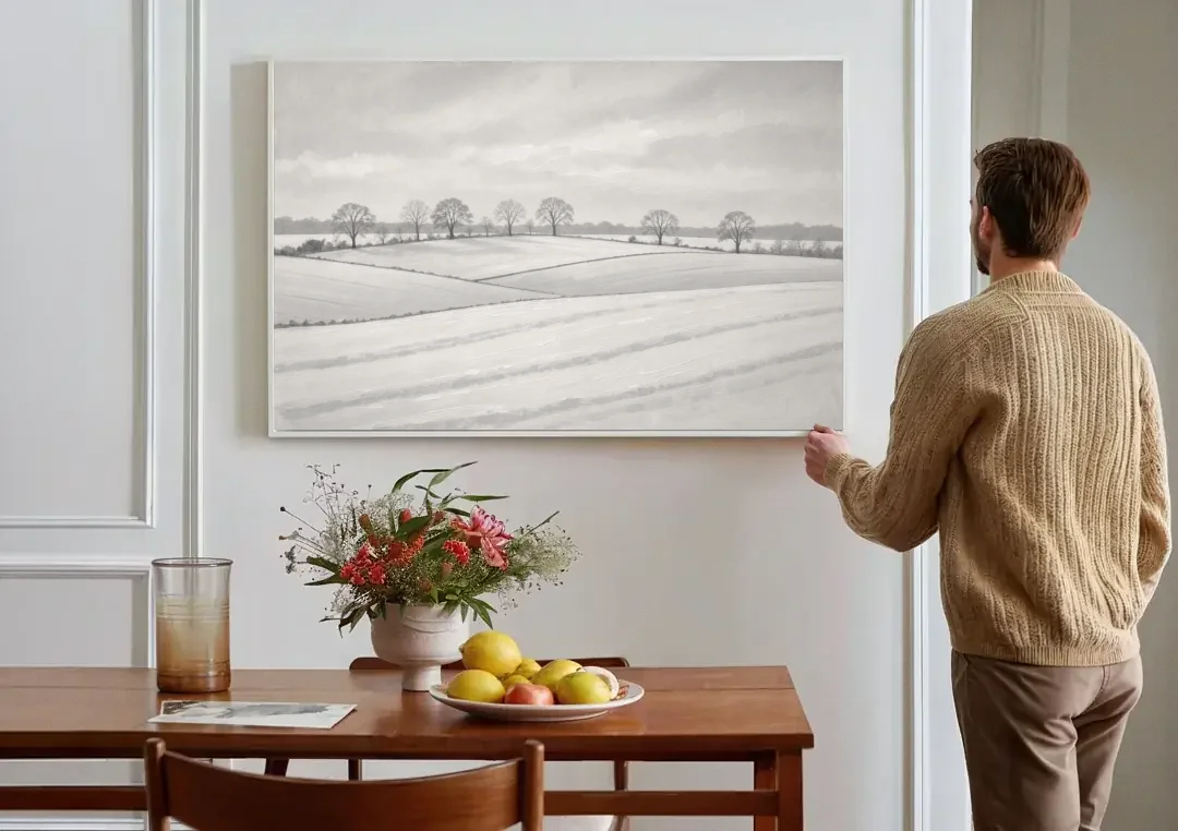 Black and White Landscape Painting of Snowy Fields canvas wall art above a dining table
