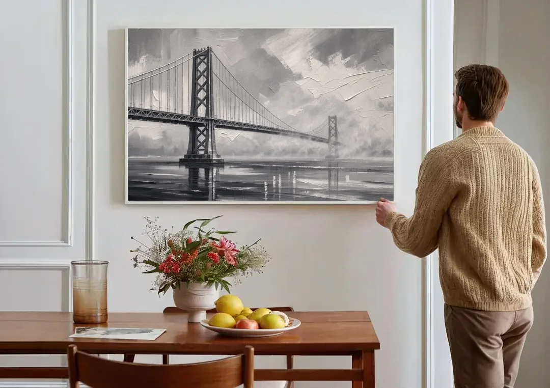 Black and White Panoramic Wall Art of a Bridge canvas wall art above a dining table