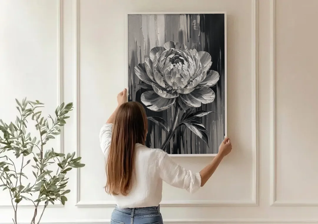 Black and White Peony Wall Art in Full Bloom canvas wall art being hung on a paneled wall