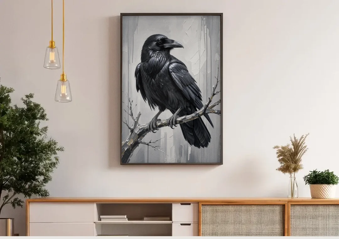 Black and White Raven on a Gnarled Branch canvas wall art above a wooden sideboard under pendant lights