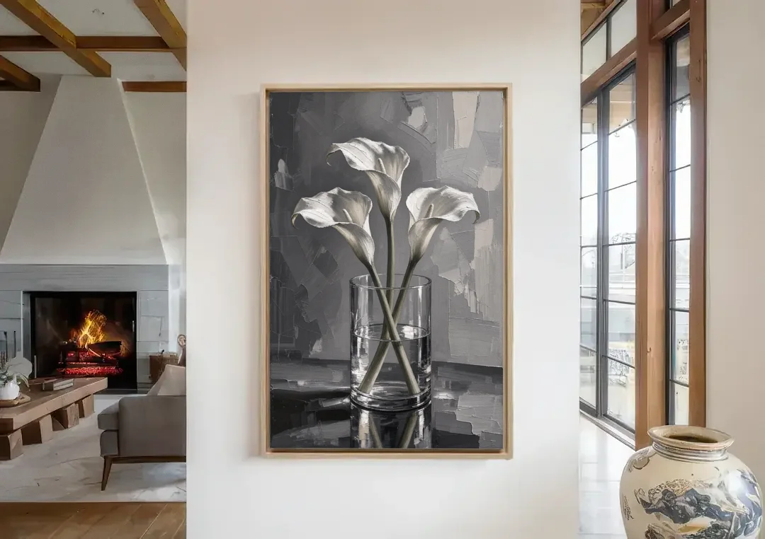 Black and White Still Life Painting Calla Lilies canvas wall art in a living room with a fireplace