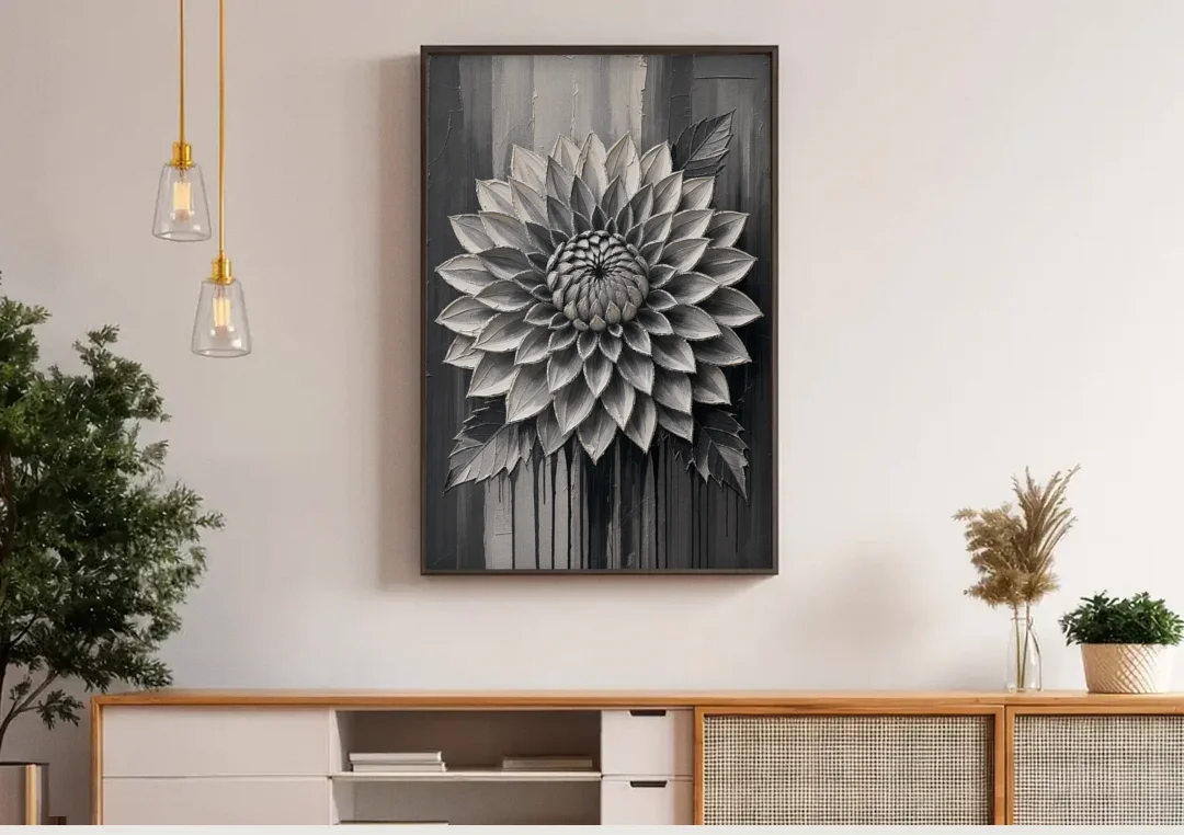 Black and White Textured Wall Art of a Dahlia canvas wall art above a wooden sideboard under pendant lights