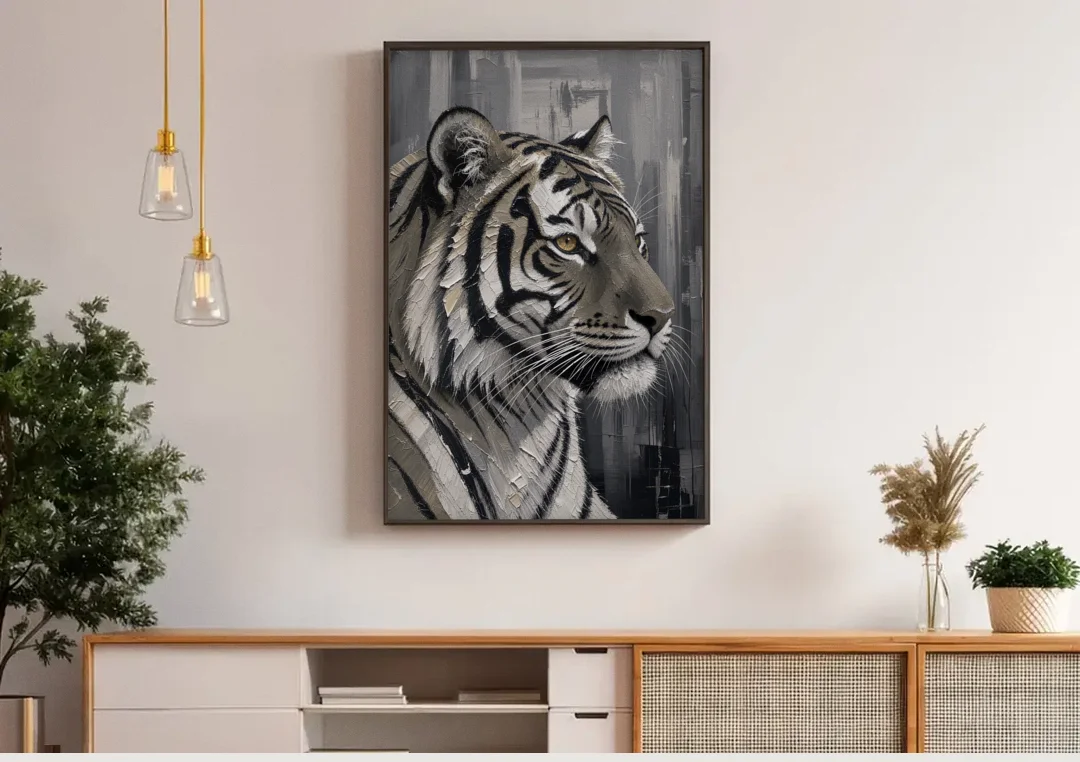 Black and White Tiger Canvas With Gold Eye canvas wall art above a wooden sideboard under pendant lights