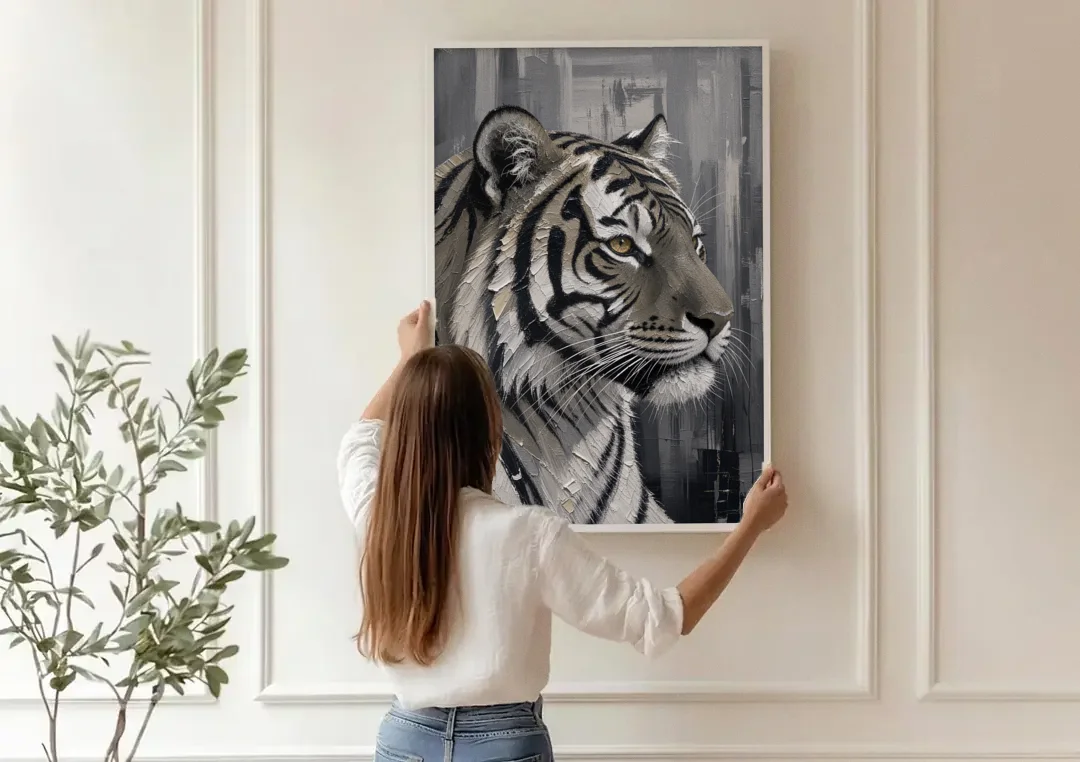 Black and White Tiger Canvas With Gold Eye canvas wall art being hung on a paneled wall
