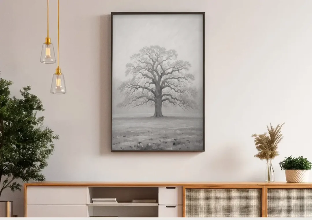 Black and White Tree Painting in Fog canvas wall art above a wooden sideboard under pendant lights