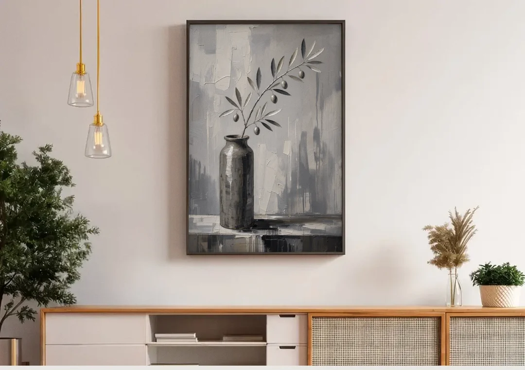 Black and White Vase Painting with Olive Branch canvas wall art above a wooden sideboard under pendant lights