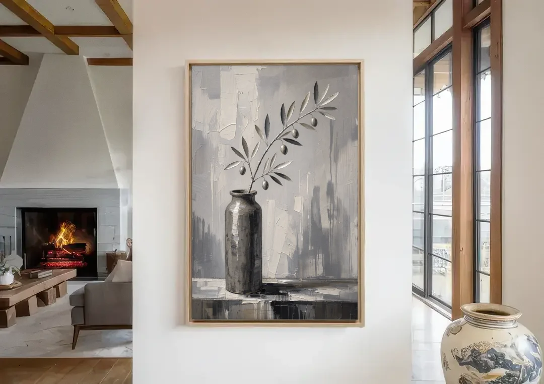 Black and White Vase Painting with Olive Branch canvas wall art in a living room with a fireplace