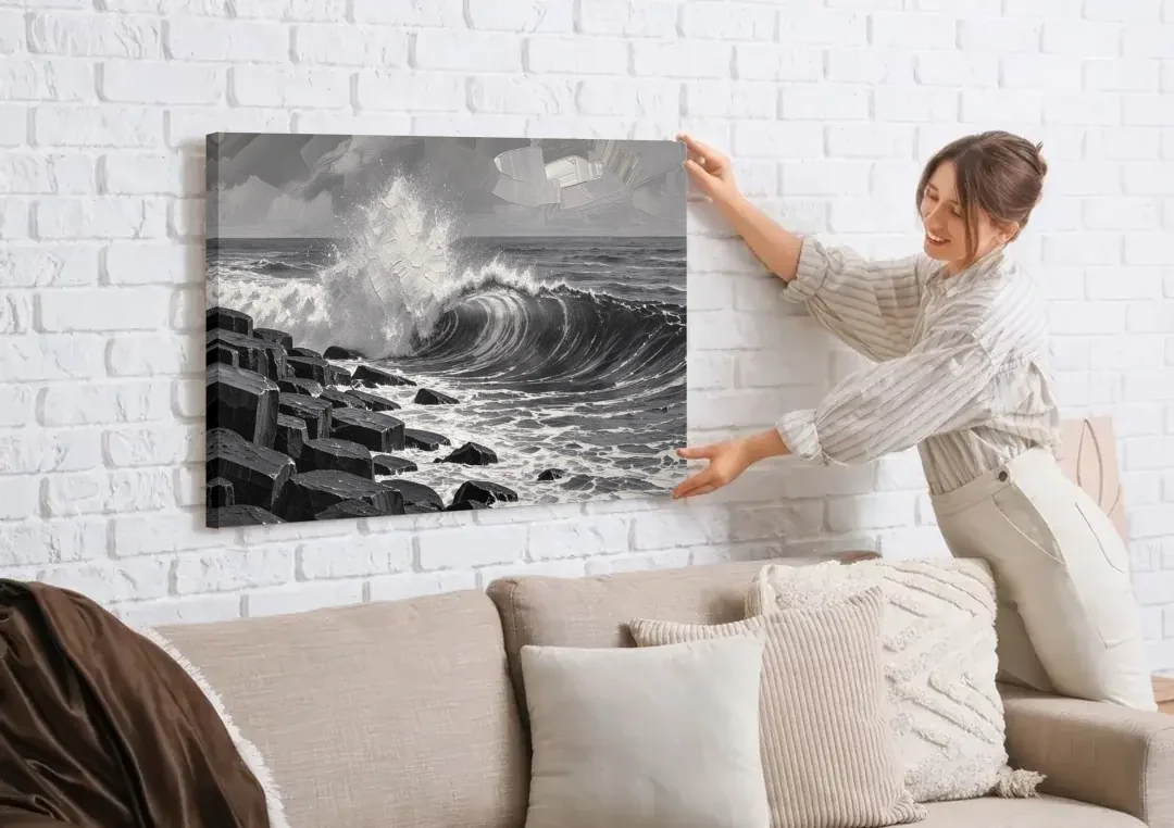 Black and White Wall Art for Living Room canvas wall art being hung on a white brick wall above a sofa