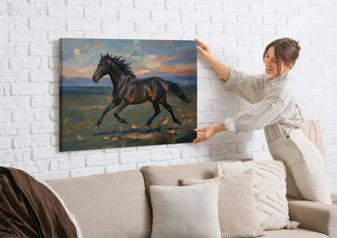 Black Horse Painting at Full Gallop canvas wall art being hung on a white brick wall above a sofa