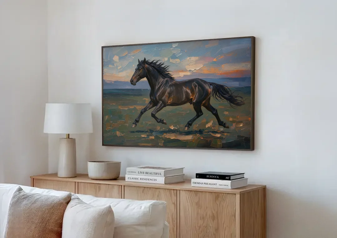 Black Horse Painting at Full Gallop canvas wall art above a wooden sideboard next to a sofa