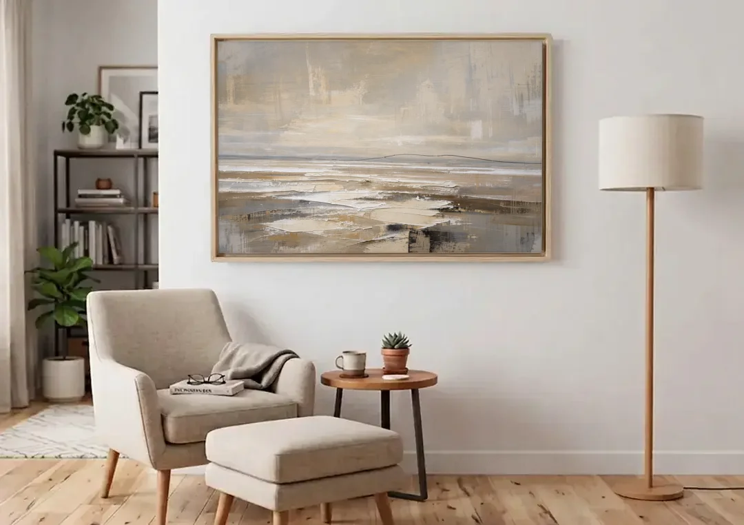 Black Line Abstract Painting Across a Salt Flat canvas wall art above an armchair in a bright living room
