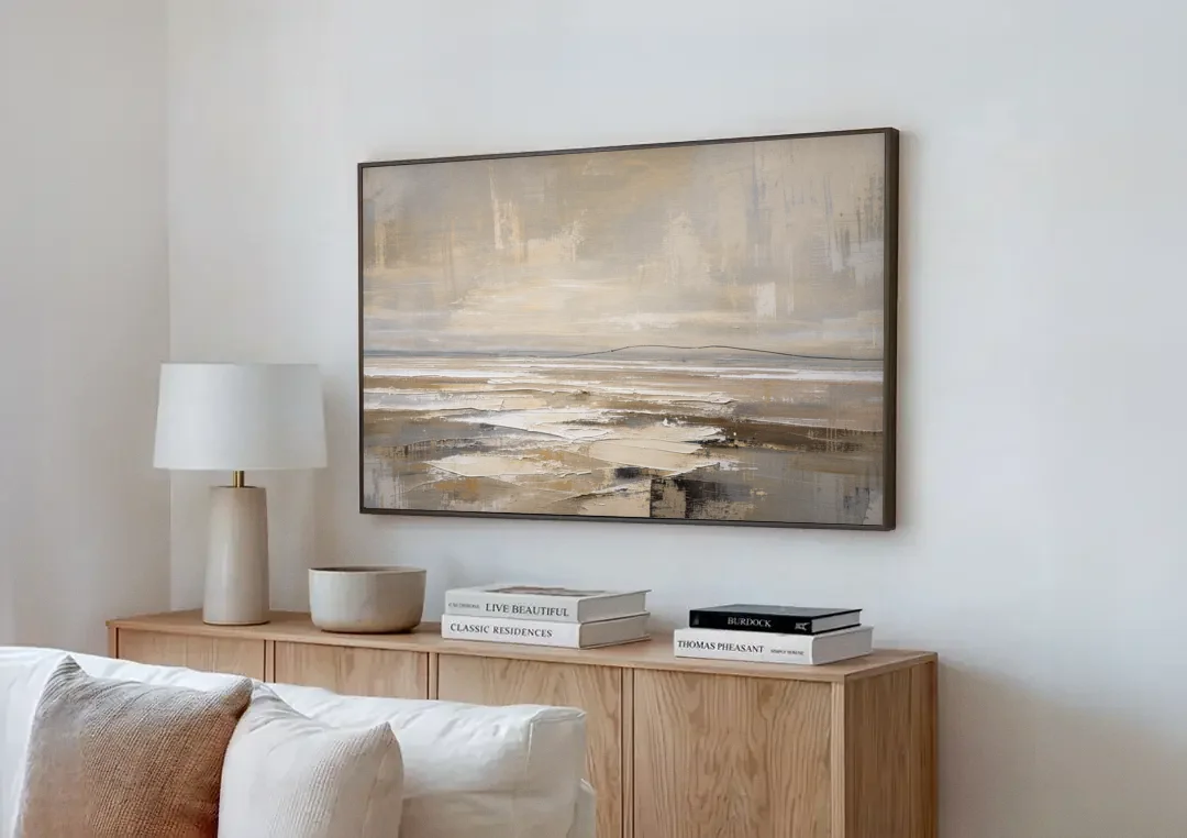 Black Line Abstract Painting Across a Salt Flat canvas wall art above a wooden sideboard next to a sofa