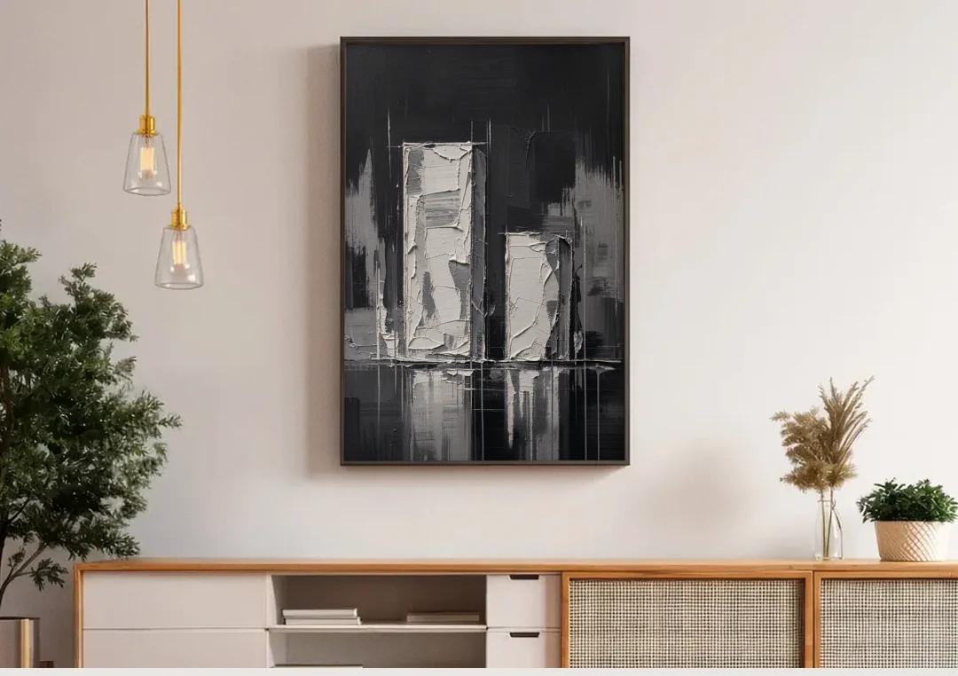 Black Minimalist Wall Art of Tall and Short Blocks canvas wall art above a wooden sideboard under pendant lights