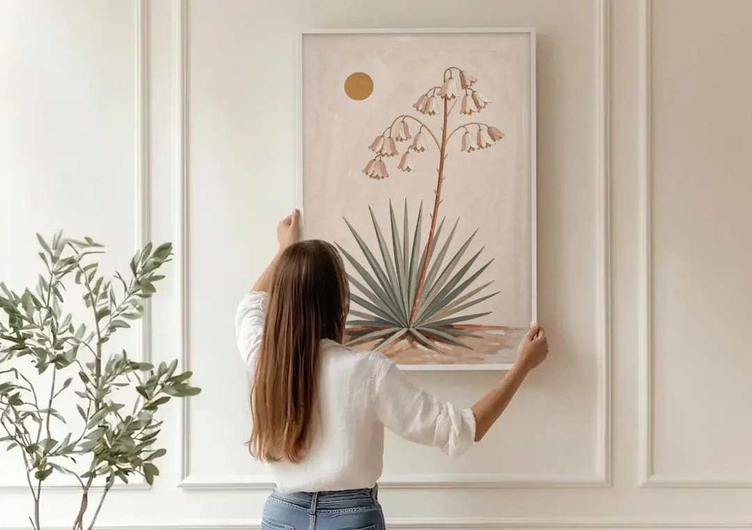 Blooming Yucca Stalk with Cream Bells canvas wall art being hung on a paneled wall