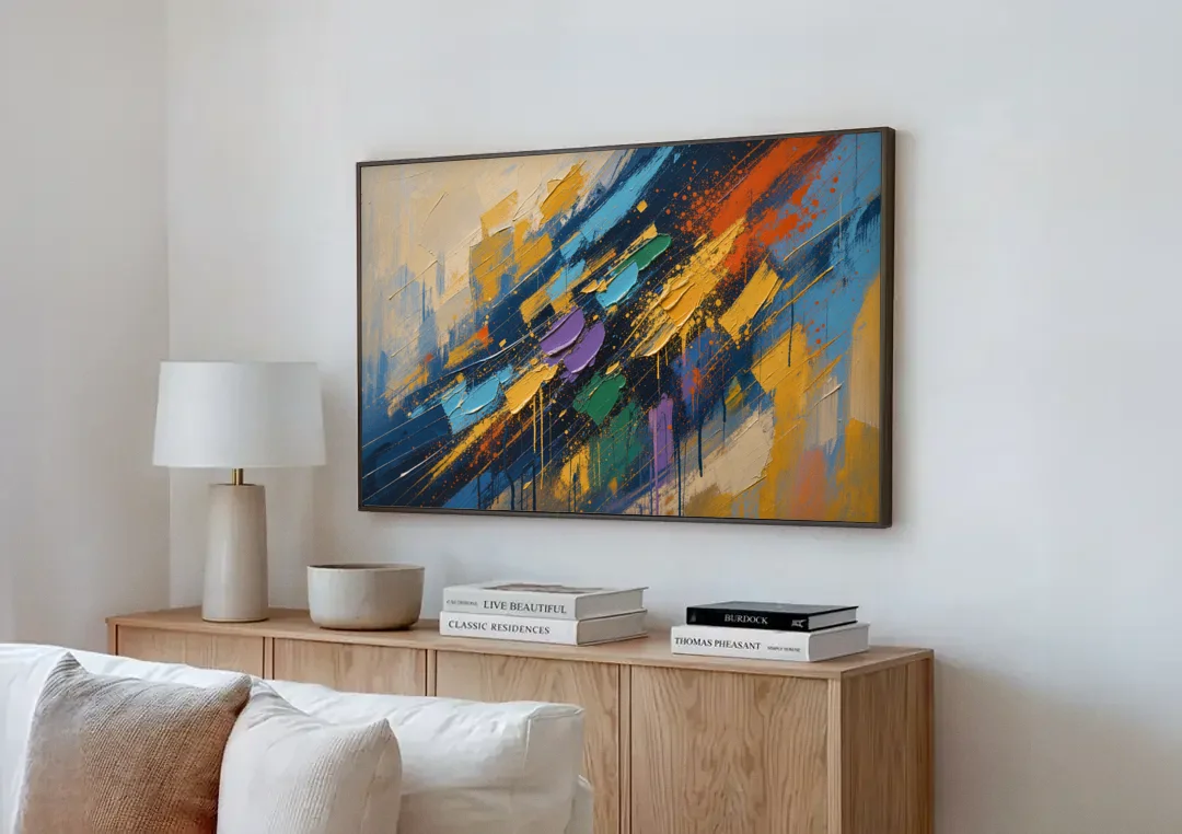 Blue Abstract Jewel Splatter Sweep canvas wall art above a wooden sideboard next to a sofa
