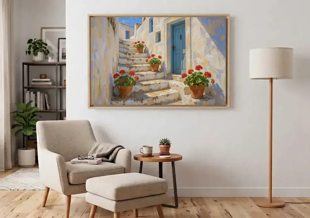 Blue and White Wall Art with Geranium Steps canvas wall art above an armchair in a bright living room