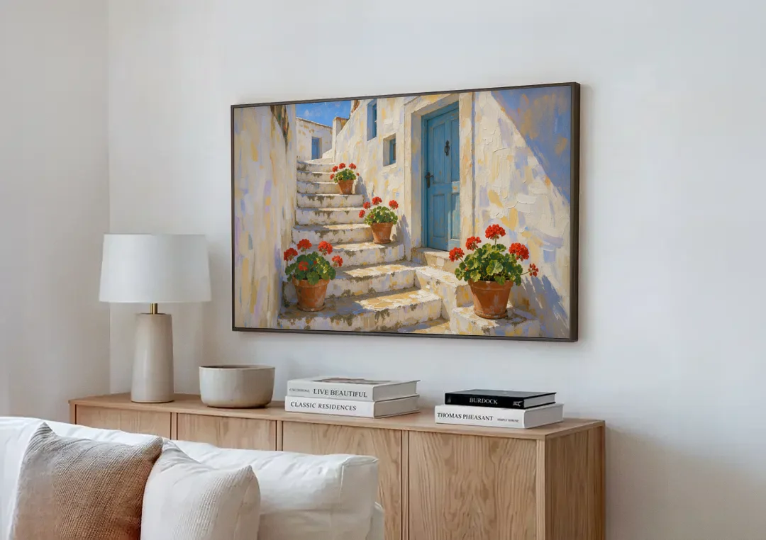 Blue and White Wall Art with Geranium Steps canvas wall art above a wooden sideboard next to a sofa
