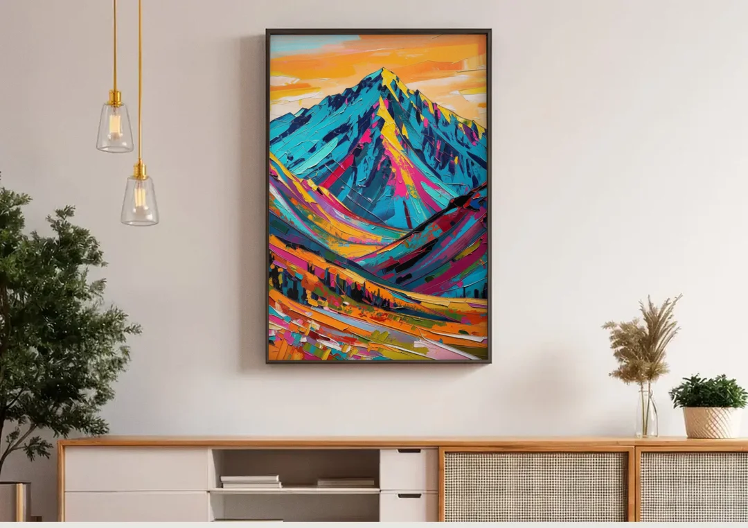 Blue Mountain Painting in Electric Light canvas wall art above a wooden sideboard under pendant lights