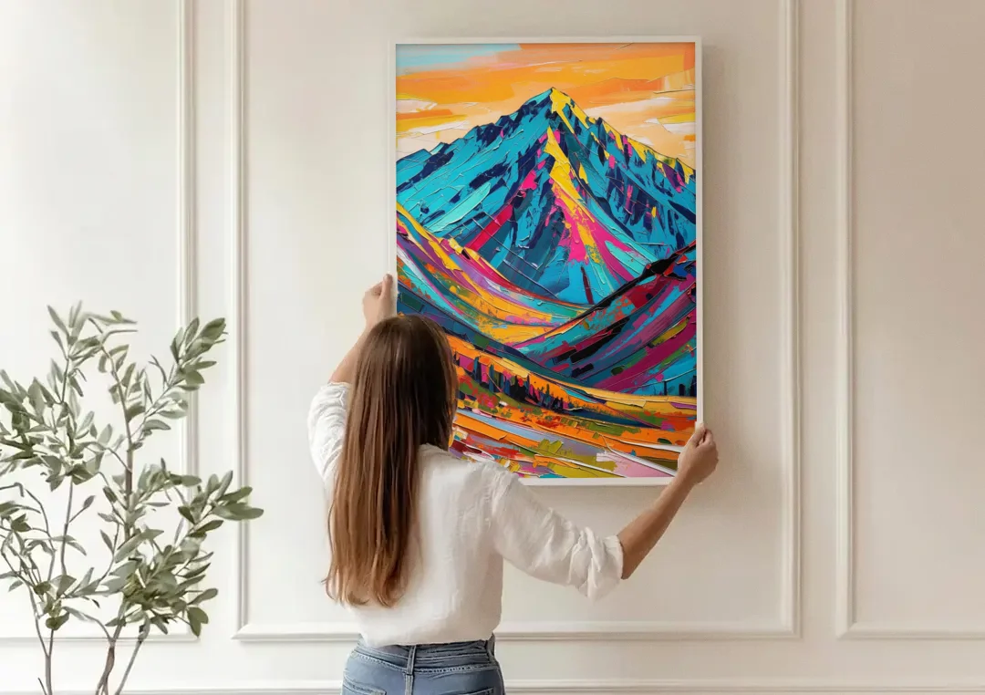 Blue Mountain Painting in Electric Light canvas wall art being hung on a paneled wall