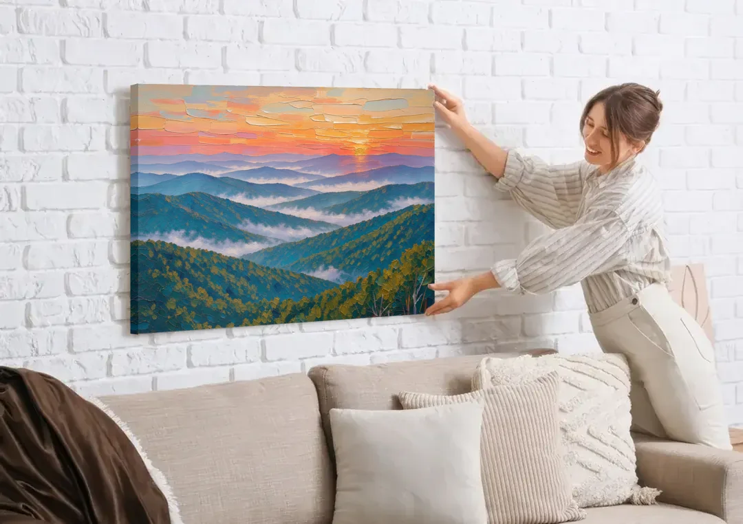 Blue Ridge Mountains Painting at Sunrise canvas wall art being hung on a white brick wall above a sofa