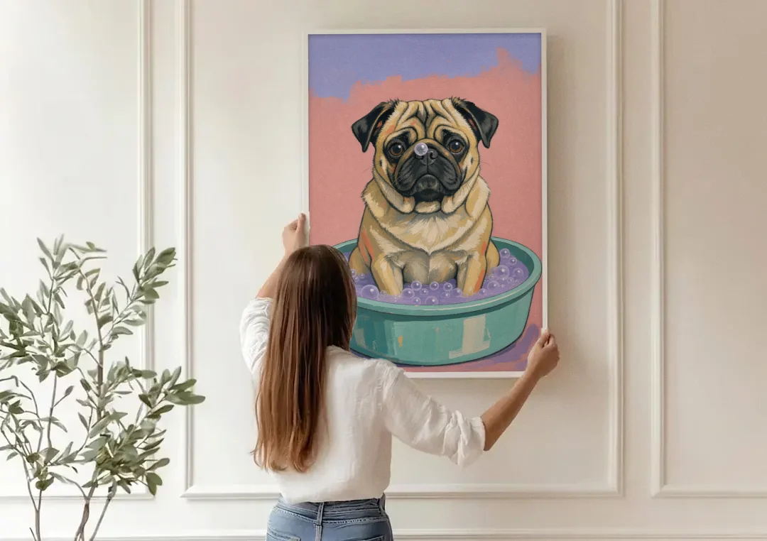 Blush Pink Bathroom Wall Art with a Pug canvas wall art being hung on a paneled wall