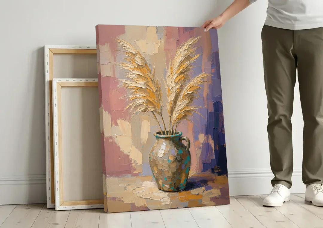 Boho Botanical Pampas Plumes in a Stoneware Jug canvas wall art leaning against a wall next to blank canvases