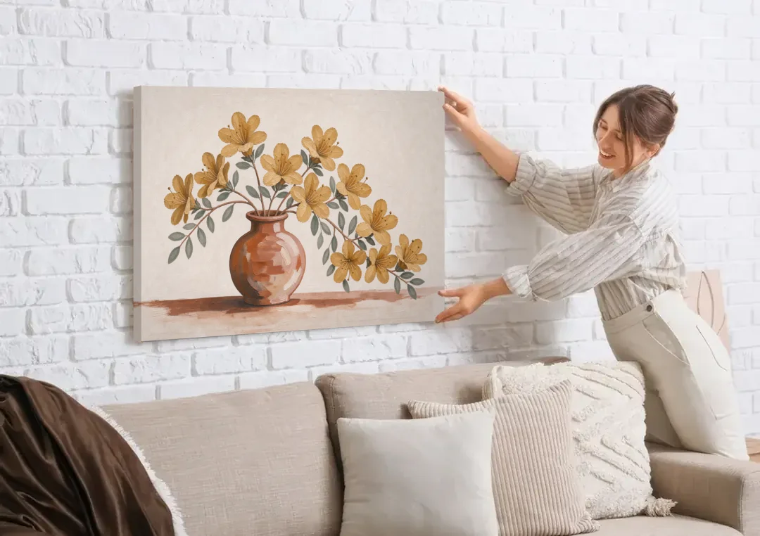 Boho Floral Wall Art with Mustard Azaleas canvas wall art being hung on a white brick wall above a sofa
