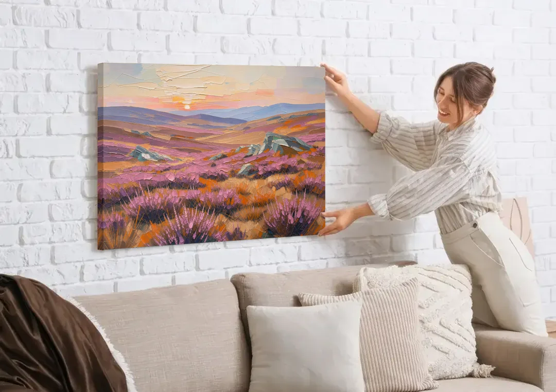 Boho Heather Moor at Sunset canvas wall art being hung on a white brick wall above a sofa
