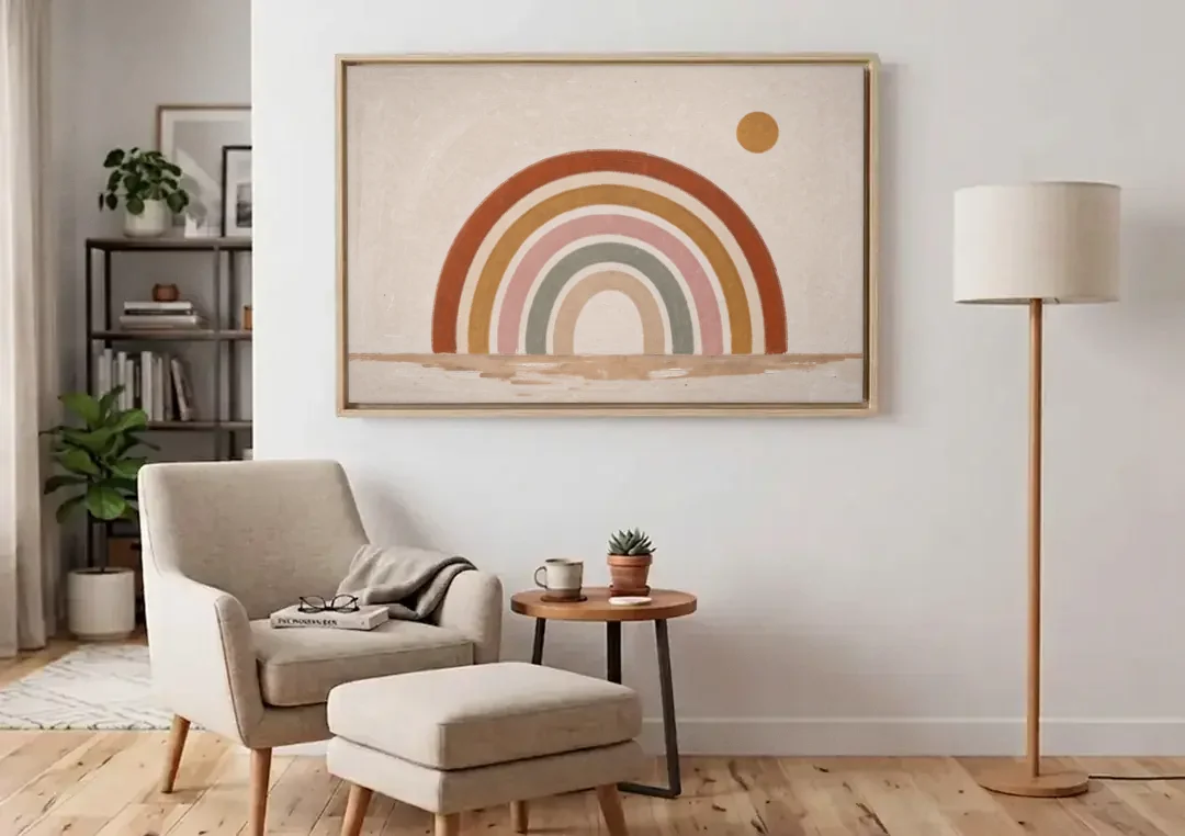 Boho Rainbow Wall Art with a Floating Sun canvas wall art above an armchair in a bright living room