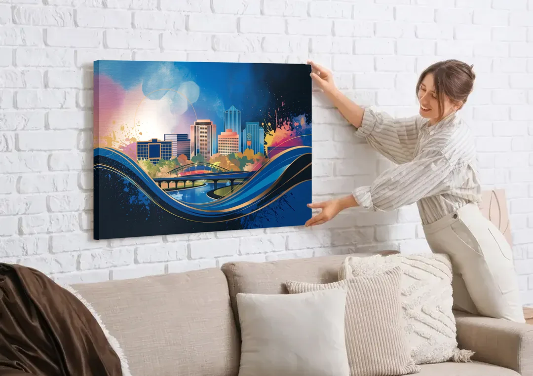 Boise State Skyline canvas wall art being hung on a white brick wall above a sofa