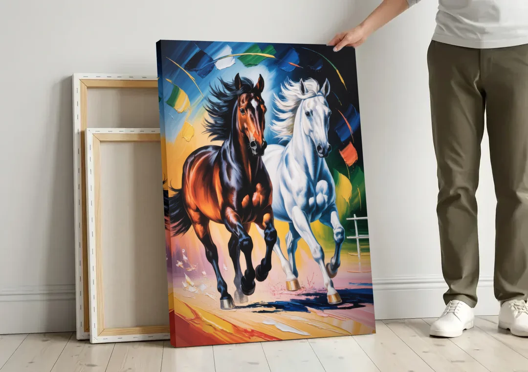 Bold Black and White Horse Duo canvas wall art leaning against a wall next to blank canvases