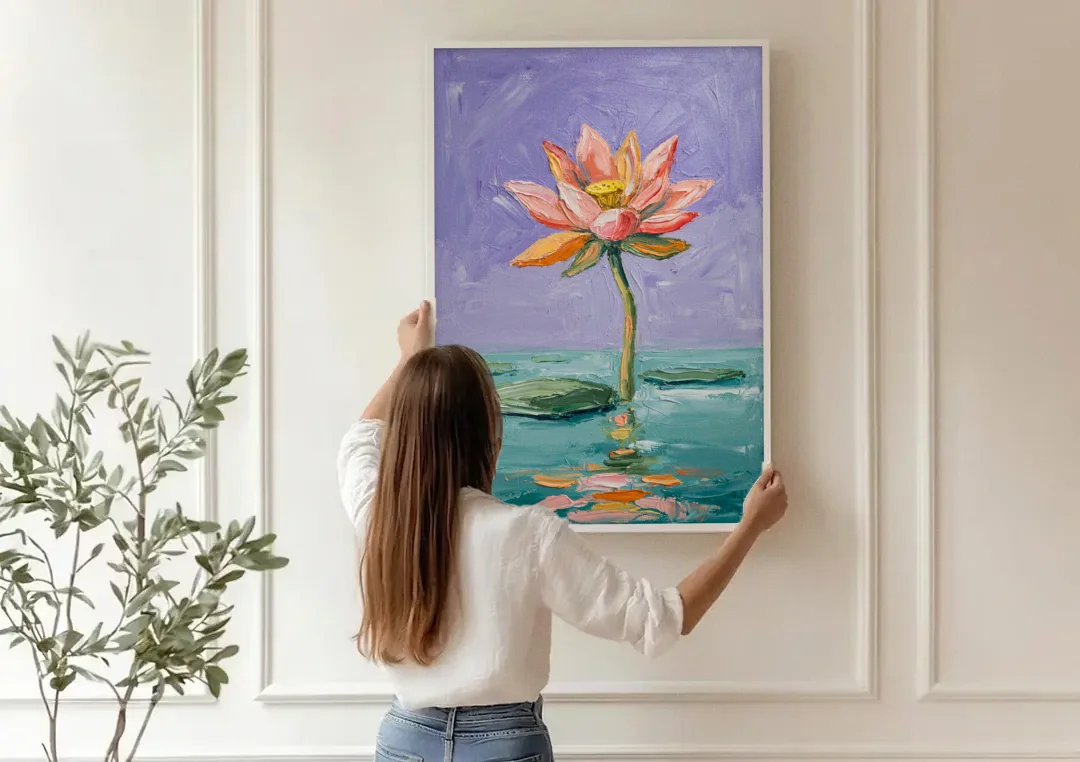 Bold Floral Wall Art Lotus Over Teal Water canvas wall art being hung on a paneled wall
