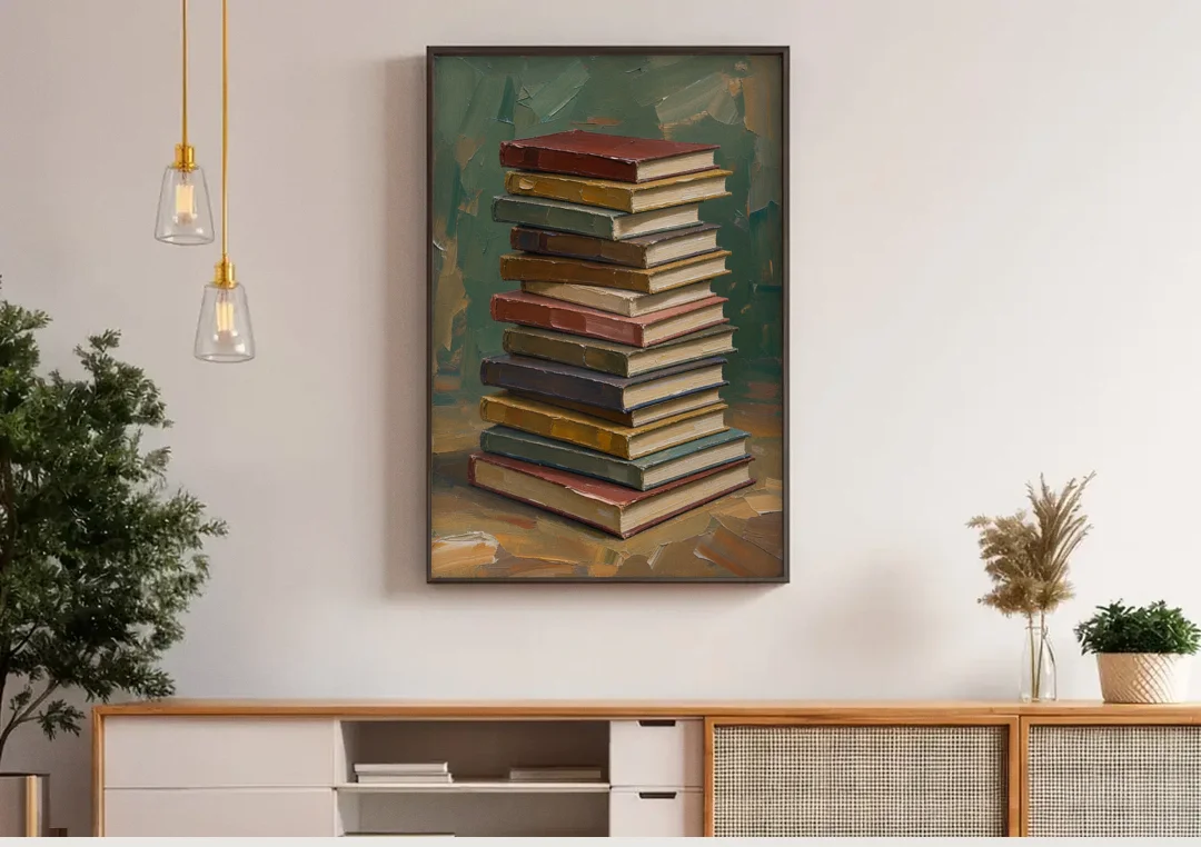 Book Stack Wall Art of a Leaning Tower canvas wall art above a wooden sideboard under pendant lights