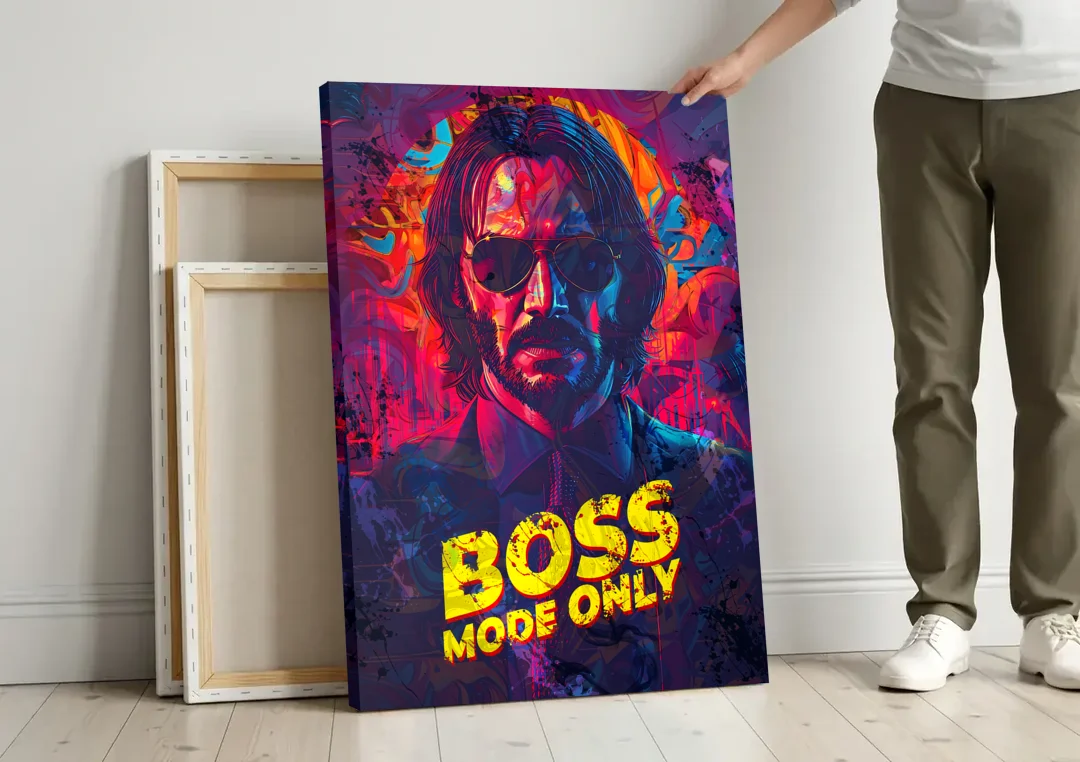 Boss Mode Only canvas wall art leaning against a wall next to blank canvases
