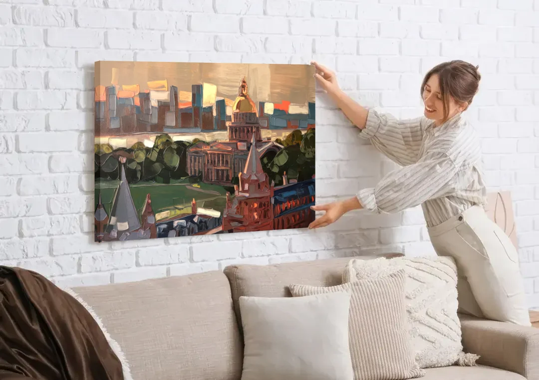 Boston Architectural Beauty canvas wall art being hung on a white brick wall above a sofa