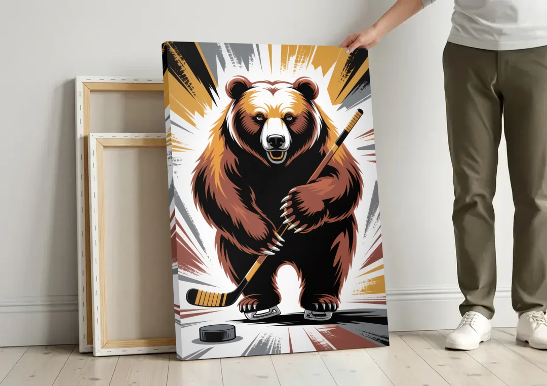 Boston Bruins Abstract Bear Art with Hockey Elements canvas wall art leaning against a wall next to blank canvases