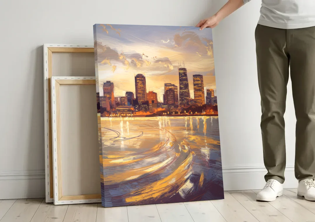 Boston Skyline with Charles River canvas wall art leaning against a wall next to blank canvases