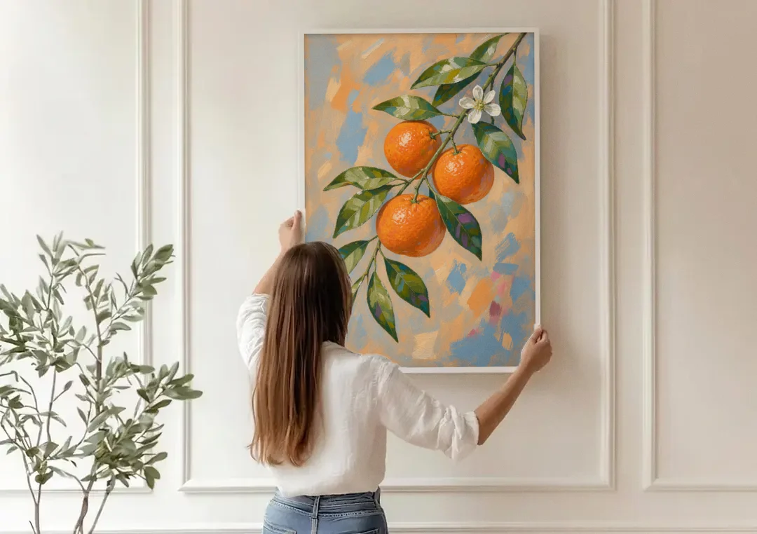 Botanical Art Prints Clementine Branch in Bloom canvas wall art being hung on a paneled wall